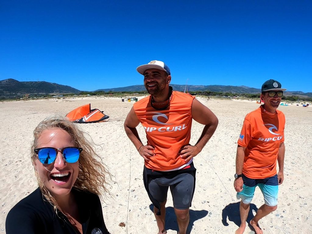 Tarifa Max kitesurfing school team on the beach giving kite lessons